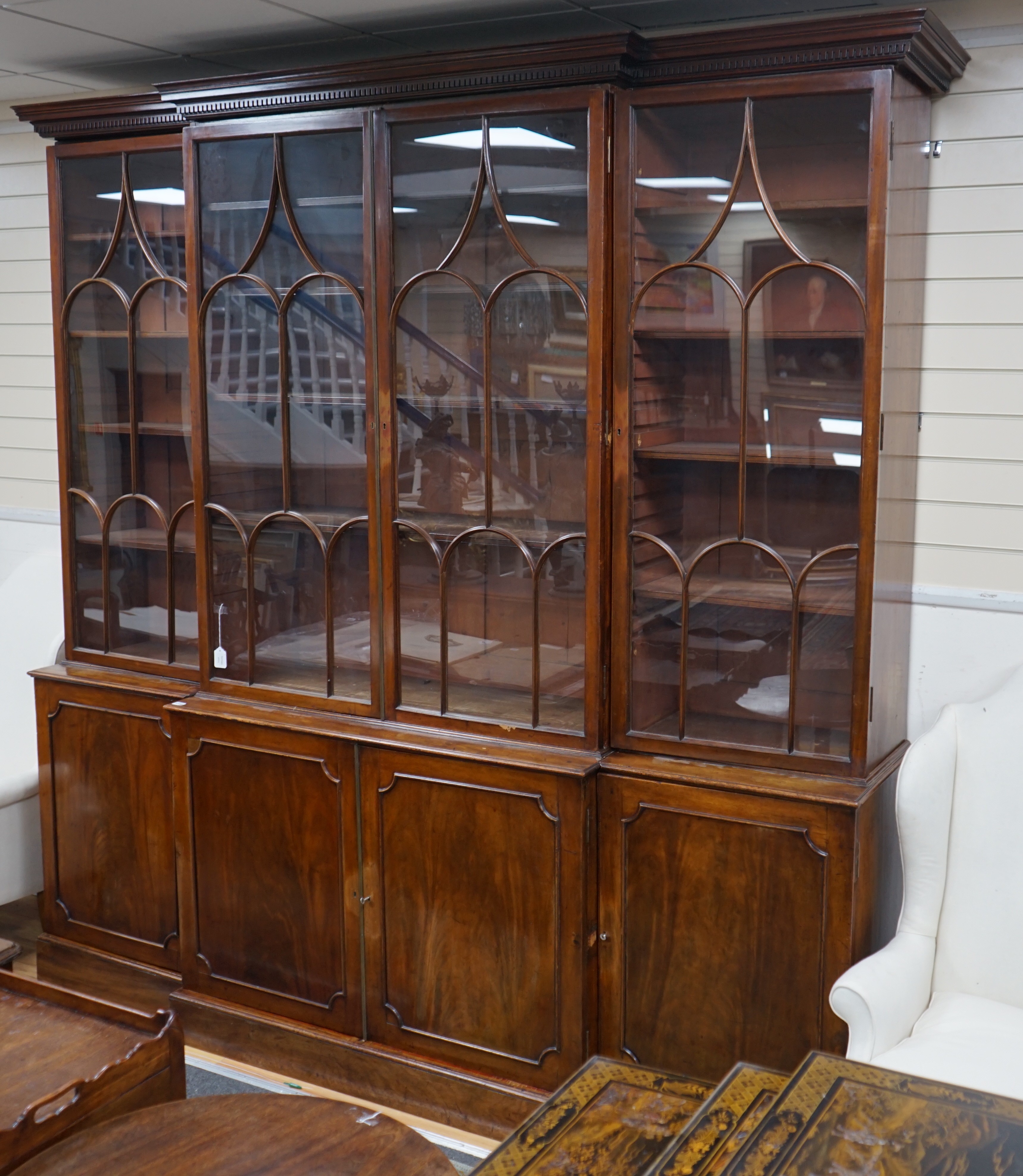 A 19th century mahogany breakfront library bookcase, length 246cm, depth 53cm, height 251cm